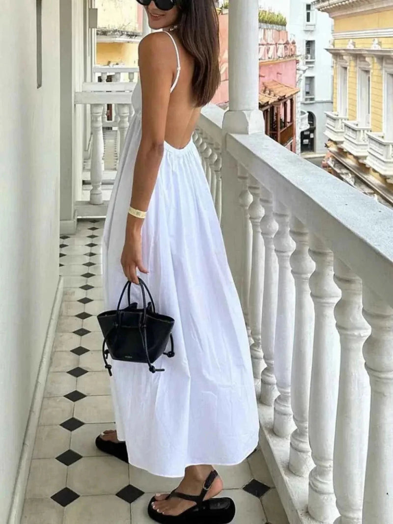 Alba – Backless maxi dress with spaghetti straps, V-neckline, and wide skirt