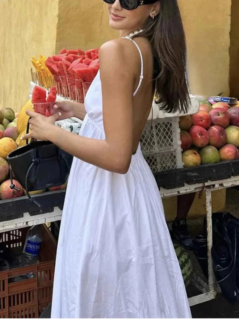Alba – Backless maxi dress with spaghetti straps, V-neckline, and wide skirt
