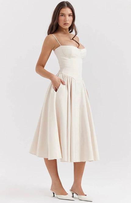 Clara – Robe midi avec haut corset, bretelles spaghetti et jupe évasée