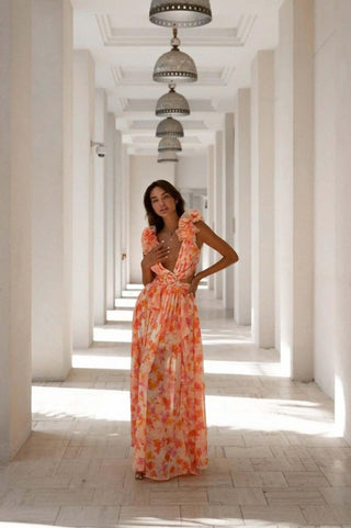 Amira – Rückenfreies Maxikleid mit Blumenmuster, Rüschen und Cut - Outs - Cecile LavelleOrange
