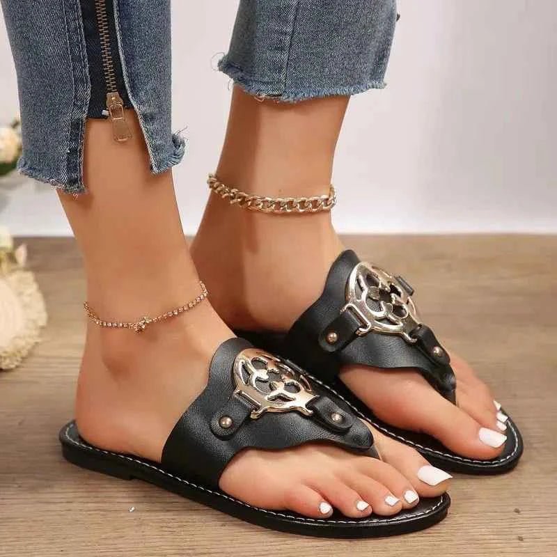 Calia – Elegant toe-post sandals with metal detail