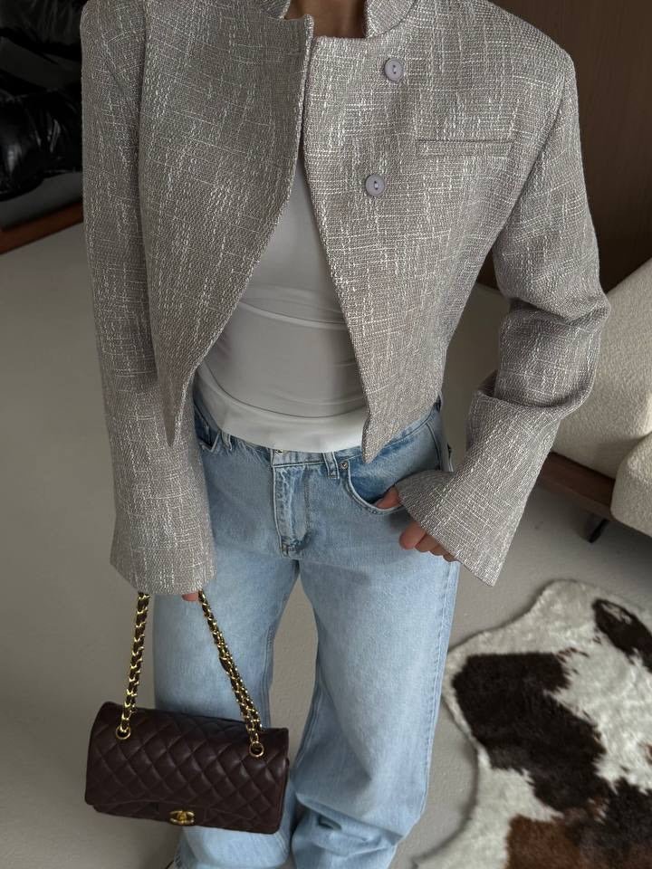 Elegant women's short jacket with stand-up collar