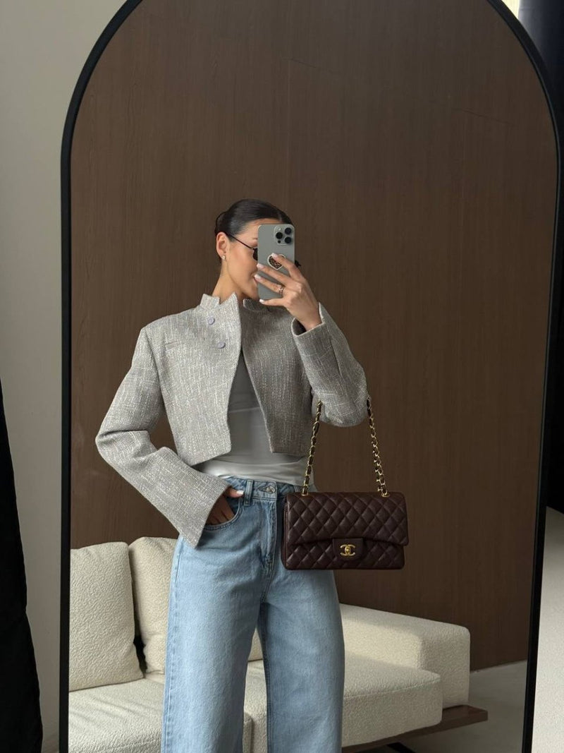 Elegant women's short jacket with stand-up collar