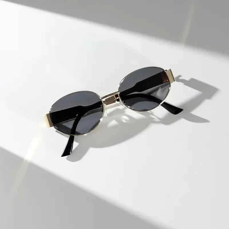 Elina – Ovale Damen-Sonnenbrille mit Metallrahmen und dunklen Gläsern