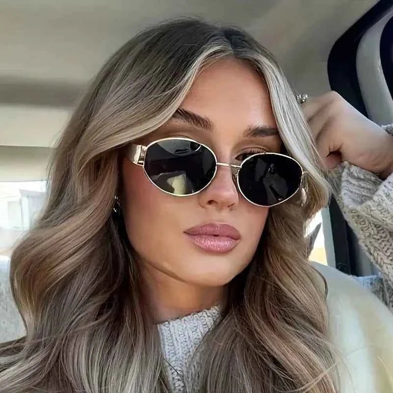 Elina – Ovale Damen-Sonnenbrille mit Metallrahmen und dunklen Gläsern
