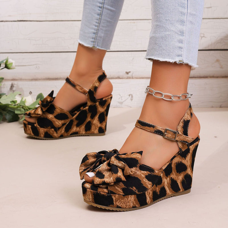 High-heel sandals with buckle in animal print
