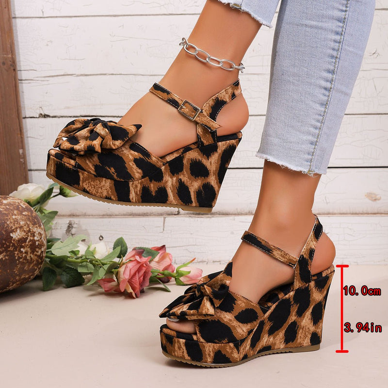 High-heel sandals with buckle in animal print