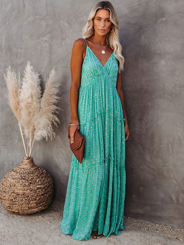 Lyra – Maxikleid mit Blumenmuster, Spaghettiträgern und Stufenrock