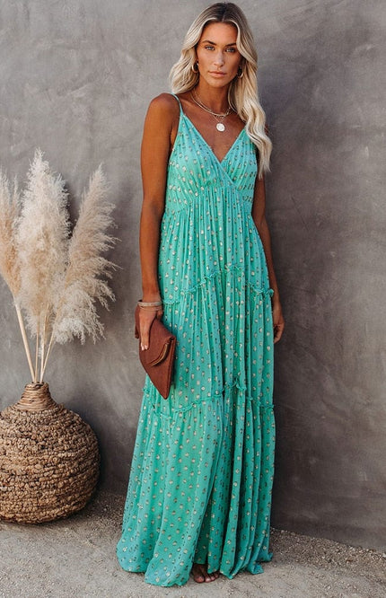 Lyra – Maxikleid mit Blumenmuster, Spaghettiträgern und Stufenrock