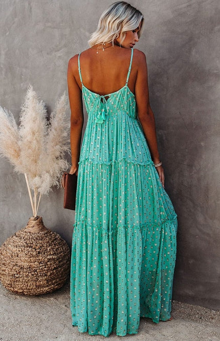Lyra – Maxikleid mit Blumenmuster, Spaghettiträgern und Stufenrock