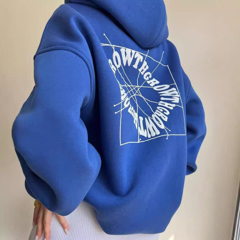 Liora – Oversized hættetrøje med statement-rygprint