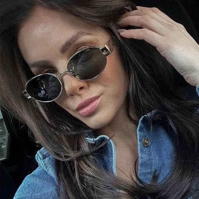 Livia – oval sunglasses with silver details and slim frame