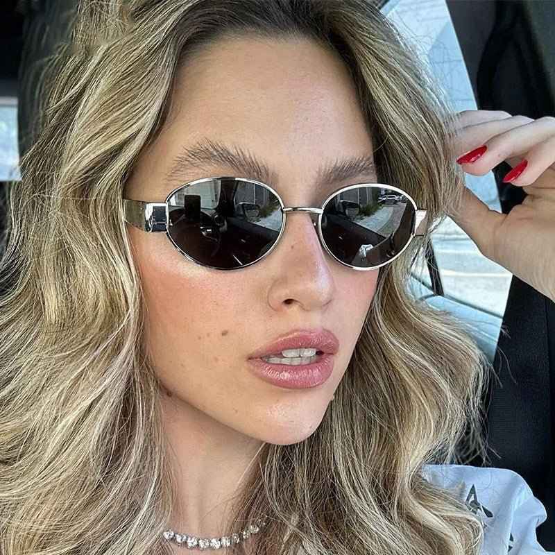 Livia – oval sunglasses with silver details and slim frame