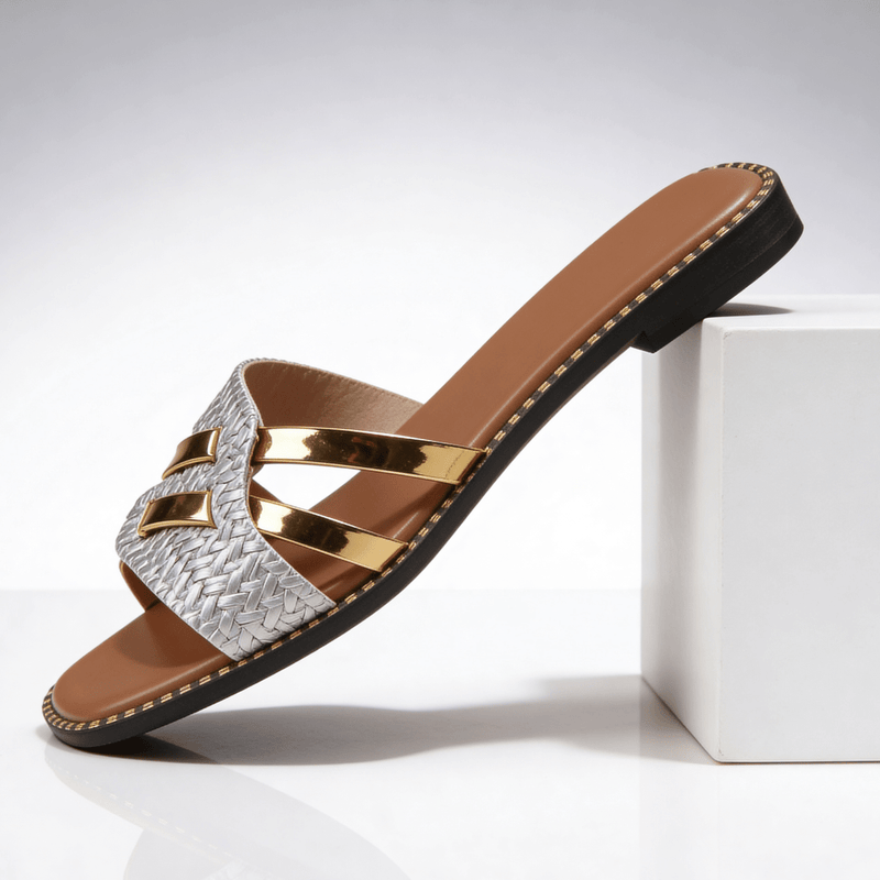 Flat women's sandals with straps and studs