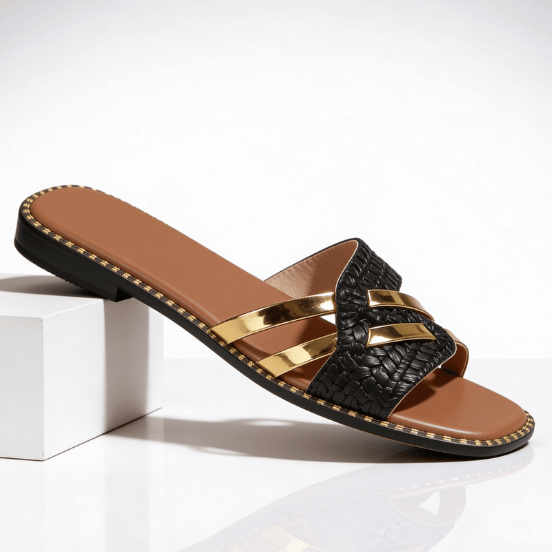 Flat women's sandals with straps and studs