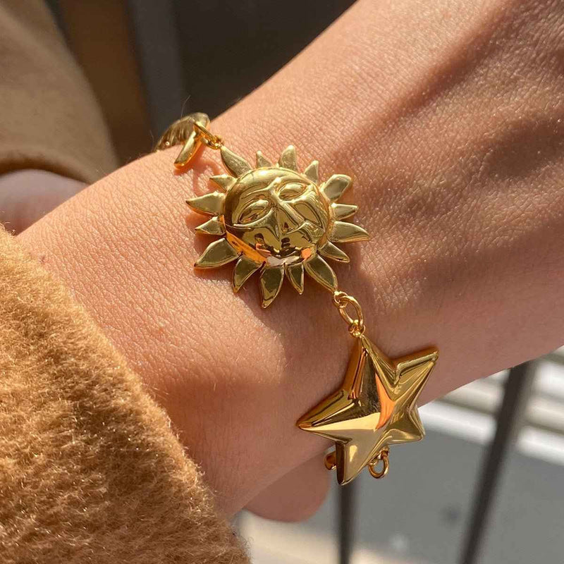 Stella – Bracelet with sun, moon, and stars in a celestial design