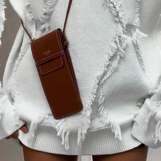 zoé – oversized fransenpullover in weiß - Cecile LavelleWeiss